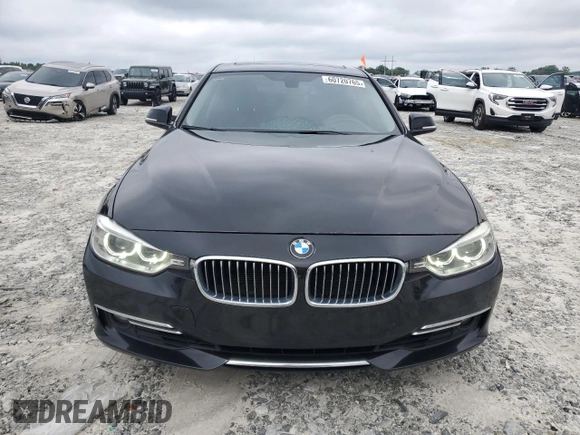 2014 BMW 3 Series 328i with VIN WBA3A5G54ENP31997, listed as a Copart auction lot 60720765 with 107,183 mi miles and Salvage title. Bid and sale history available at DreamBid. Image 5.