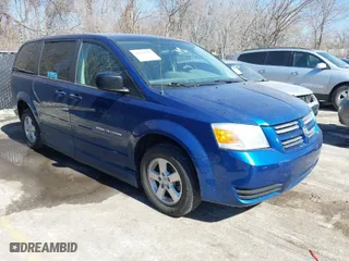 2010 Dodge Grand Caravan SE with VIN 2D4RN4DE7AR296991, listed as a IAAI auction lot 41652582 with 122,884 mi miles. Bid and sale history available at carsss.com. Image 1.