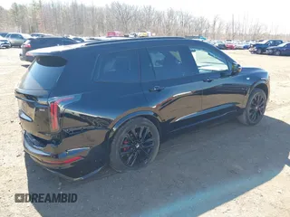 2022 Cadillac XT6 Sport with VIN 1GYKPGRS3NZ143717, listed as a IAAI auction lot 41758715 with 49,083 mi miles. Bid and sale history available at carsss.com. Image 4.
