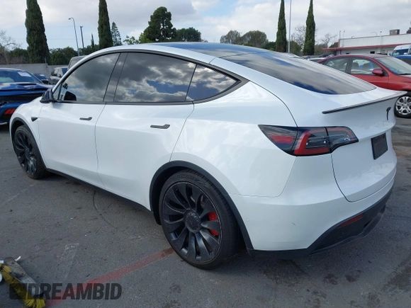 2022 Tesla Model Y Performance with VIN 7SAYGDEF1NF559572, listed as a IAAI auction lot 41516070 with 43,240 mi miles and . Bid and sale history available at DreamBid. Image 3.