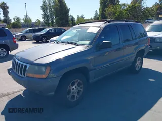 2001 Jeep Grand Cherokee Laredo with VIN 1J4GW48S31C550460, listed as a IAAI auction lot 42769410 with 261,640 mi miles and . Bid and sale history available at DreamBid. Image 6.