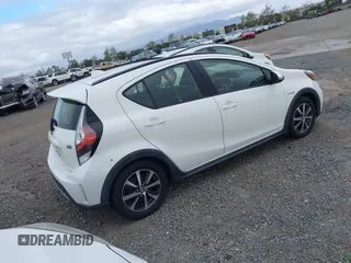 2018 Toyota Prius One with VIN JTDKDTB35J1599608, listed as a IAAI auction lot 42041924 with 89,156 mi miles and . Bid and sale history available at DreamBid. Image 4.