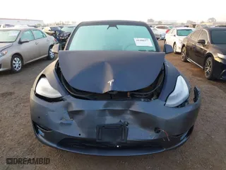 2021 Tesla Model Y Standard Range with VIN 5YJYGDED4MF121963, listed as a IAAI auction lot 41490477 with 41,941 mi miles. Bid and sale history available at carsss.com. Image 12.