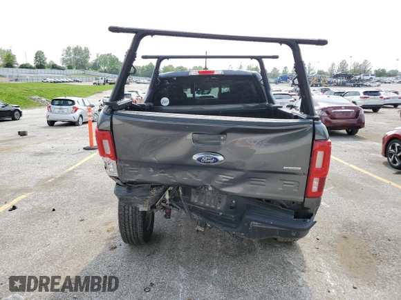 2019 Ford Ranger XL with VIN 1FTER4FHXKLA71059, listed as a Copart auction lot 57252615 with 109,351 mi miles and Salvage title. Bid and sale history available at DreamBid. Image 6.