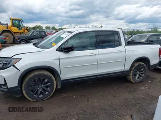 2021 Honda Ridgeline Sport with VIN 5FPYK3F14MB005117, listed as a IAAI auction lot 42343059 with 58,862 mi miles and . Bid and sale history available at DreamBid. Image 14.