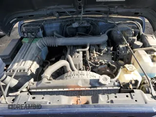 2000 Jeep Wrangler Sport with VIN 1J4FA49S2YP803165, listed as a Copart auction lot 85611904 with 192,427 mi miles and Non repairable. Bid and sale history available at DreamBid. Image 11.