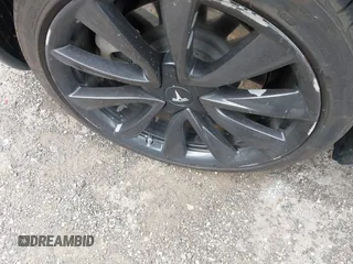 2020 Tesla Model 3 Long Range with VIN 5YJ3E1EB2LF646449, listed as a IAAI auction lot 42059086 with 120,981 mi miles and . Bid and sale history available at DreamBid. Image 12.