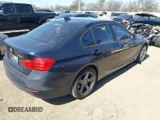 2015 BMW 3 Series 320i with VIN WBA3B1C53FK138310, listed as a IAAI auction lot 41677208 with 57,891 mi miles. Bid and sale history available at carsss.com. Image 4.
