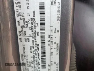 2021 Ford F-150 XL with VIN 1FTEW1CP1MFC04764, listed as a Copart auction lot 59572975 with 61,576 mi miles and Salvage title. Bid and sale history available at DreamBid. Image 12.
