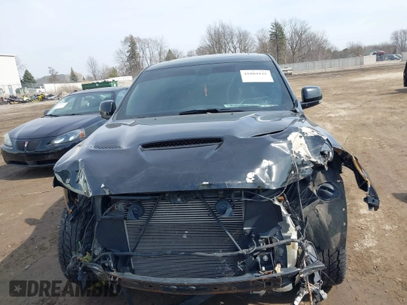 2014 Dodge Durango R/T z VIN 1C4SDJCT7EC468497, wystawiony jako IAAI lot #41804145 z przebiegiem 167 392 mil mil oraz . Historia ofert i sprzedaży dostępna na DreamBid. Obrazek 12.
