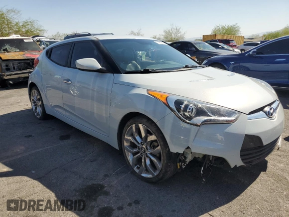 2015 Hyundai Veloster z VIN KMHTC6ADXFU222793, wystawiony jako Copart lot #57861415 z przebiegiem 98 318 mil mil oraz Szkoda całkowita • Salvage title. Historia ofert i sprzedaży dostępna na DreamBid. Obrazek 4.