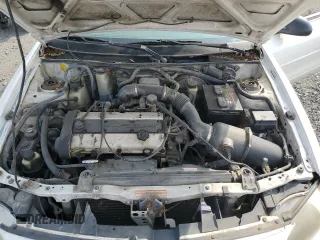 1998 Ford Escort z VIN 3FALP1138WR126709, wystawiony jako Copart lot #69271634 z przebiegiem 234 137 mil mil oraz Szkoda całkowita • Salvage title. Historia ofert i sprzedaży dostępna na DreamBid. Obrazek 11.
