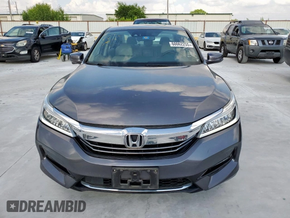 2017 Honda Accord Touring z VIN JHMCR6F79HC000923, wystawiony jako Copart lot #60062255 z przebiegiem 92 597 mil mil oraz Czysty tytuł • Clean title. Historia ofert i sprzedaży dostępna na DreamBid. Obrazek 5.