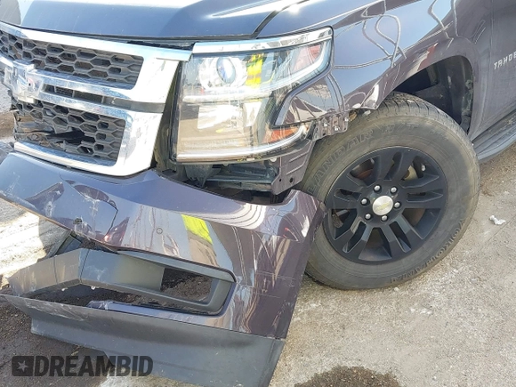 2015 Chevrolet Tahoe LS with VIN 1GNSCAKCXFR628303, listed as a IAAI auction lot 42002698 with 152,141 mi miles and . Bid and sale history available at DreamBid. Image 6.