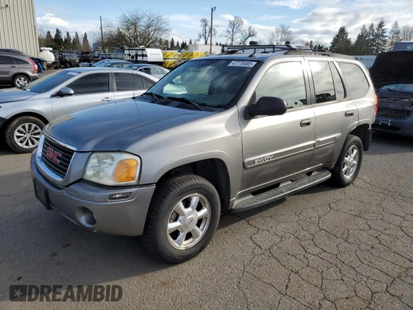 2005 GMC Envoy SLE with VIN 1GKDS13S952104730, listed as a Copart auction lot 47778585 with 187,712 mi miles and Salvage Title. Bid and sale history available at carsss.com. Image 1.