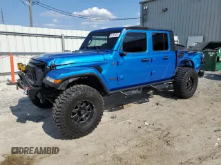 2020 Jeep Gladiator Overland z VIN 1C6HJTFG4LL162262, wystawiony jako Copart lot #57261325 z przebiegiem 74 856 mil mil oraz Szkoda całkowita • Salvage title. Historia ofert i sprzedaży dostępna na DreamBid. Obrazek 1.
