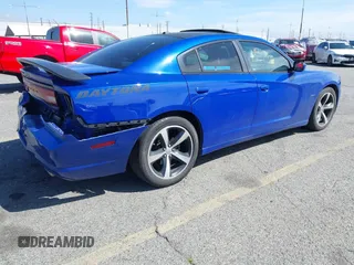 2013 Dodge Charger RT with VIN 2C3CDXCT5DH683562, listed as a IAAI auction lot 41736528 with 192,333 mi miles. Bid and sale history available at carsss.com. Image 4.