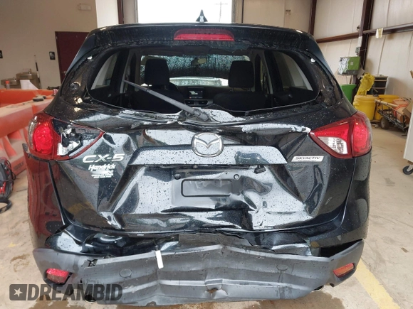 2016 Mazda CX-5 Touring with VIN JM3KE2CY7G0867355, listed as a IAAI auction lot 41963169 with 117,727 mi miles and . Bid and sale history available at DreamBid. Image 6.