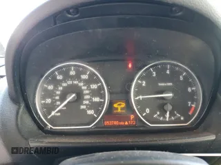 2010 BMW 1 Series 128i with VIN WBAUL7C50AVJ77979, listed as a Copart auction lot 79938664 with 53,740 mi miles and Salvage title. Bid and sale history available at DreamBid. Image 9.