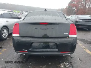 2015 Chrysler 300 Limited with VIN 2C3CCAAG8FH807168, listed as a IAAI auction lot 41056399 with Not Provided miles. Bid and sale history available at carsss.com. Image 16.