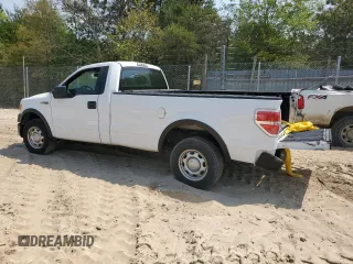 2013 Ford F-150 XL with VIN 1FTMF1CM8DKE67276, listed as a Copart auction lot 52690085 with 149,034 mi miles and Salvage title. Bid and sale history available at DreamBid. Image 2.