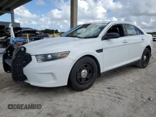 2015 Ford Police Interceptor with VIN 1FAHP2L82FG203554, listed as a Copart auction lot 73117244 with 99,385 mi miles and Clean title. Bid and sale history available at DreamBid. Image 1.