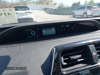 2022 Toyota Prius L Eco with VIN JTDKAMFUXN3159170, listed as a IAAI auction lot 41930288 with 53,414 mi miles and . Bid and sale history available at DreamBid. Image 7.