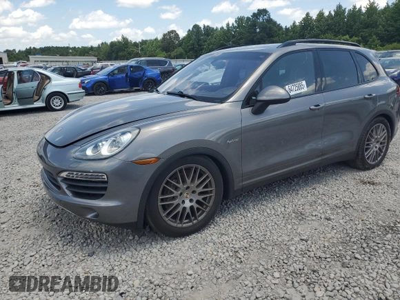 2012 Porsche Cayenne S Hybrid with VIN WP1AE2A24CLA93950, listed as a Copart auction lot 64725885 with Not provided miles and Clean title. Bid and sale history available at DreamBid. Image 1.