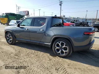 2022 Rivian R1T Adventure z VIN 7FCTGAAA9NN008771, wystawiony jako Copart lot #56243835 z przebiegiem 31 006 mil mil oraz Szkody całkowita. Historia ofert i sprzedaży dostępna na DreamBid. Obrazek 2.
