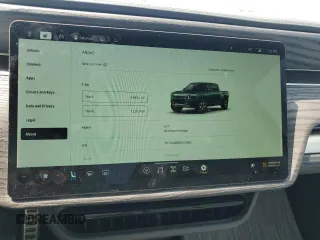 2022 Rivian R1T Adventure z VIN 7FCTGAAA5NN013983, wystawiony jako Copart lot #68013724 z przebiegiem 9006 mil mil oraz Szkody całkowita. Historia ofert i sprzedaży dostępna na DreamBid. Obrazek 9.
