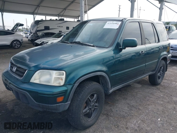2000 Honda CR-V SE with VIN JHLRD1875YS022873, listed as a IAAI auction lot 42034984 with 210,853 mi miles. Bid and sale history available at carsss.com. Image 2.