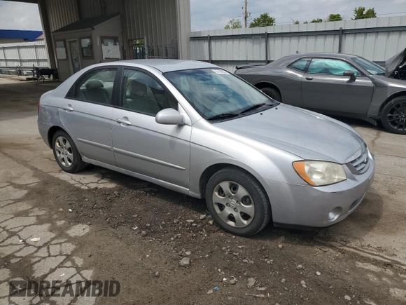 2006 Kia Spectra EX z VIN KNAFE121565316347, wystawiony jako Copart lot #57169865 z przebiegiem 82 782 mil mil oraz Czysty tytuł • Clean title. Historia ofert i sprzedaży dostępna na DreamBid. Obrazek 4.