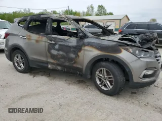 2017 Hyundai Santa Fe 2.4L z VIN 5NMZUDLB0HH042101, wystawiony jako Copart lot #55058145 z przebiegiem Nie podano mil oraz Szkoda całkowita • Salvage title. Historia ofert i sprzedaży dostępna na DreamBid. Obrazek 4.