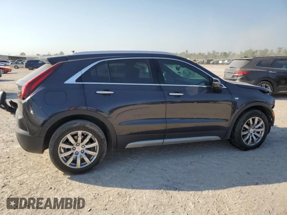 2022 Cadillac XT4 FWD Premium Luxury z VIN 1GYFZCR44NF151123, wystawiony jako Copart lot #50312745 z przebiegiem 46 820 mil mil oraz Szkoda całkowita • Salvage title. Historia ofert i sprzedaży dostępna na DreamBid. Obrazek 3.