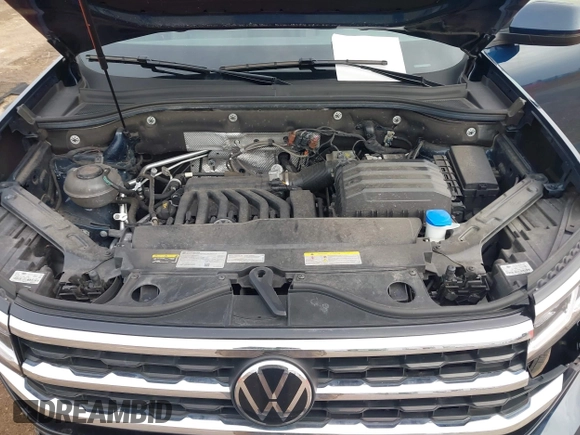 2023 Volkswagen Atlas SE z VIN 1V2KR2CA8PC504298, wystawiony jako IAAI lot #41234957 z przebiegiem 34 762 mil mil oraz . Historia ofert i sprzedaży dostępna na DreamBid. Obrazek 10.