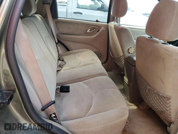 2002 Mazda Tribute LX with VIN 4F2YU09122KM55085, listed as a Copart auction lot 71604184 with 185,158 mi miles and Salvage Title. Bid and sale history available at DreamBid. Image 11.