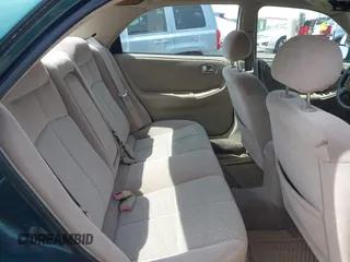 2001 Mazda 626 LX with VIN 1YVGF22D915241384, listed as a IAAI auction lot 41927705 with 231,801 mi miles. Bid and sale history available at carsss.com. Image 8.