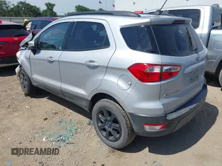 2021 Ford EcoSport SE z VIN MAJ3S2GE6MC438889, wystawiony jako IAAI lot #42250611 z przebiegiem 42 611 mil mil oraz . Historia ofert i sprzedaży dostępna na DreamBid. Obrazek 3.