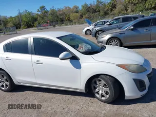 2011 Mazda 3 i Sport with VIN JM1BL1UFXB1434590, listed as a IAAI auction lot 41769754 with 144,046 mi miles and . Bid and sale history available at DreamBid. Image 13.