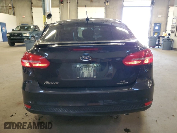 2015 Ford Focus SE with VIN 1FADP3F26FL385522, listed as a Copart auction lot 57963245 with 82,794 mi miles and Salvage title. Bid and sale history available at DreamBid. Image 6.