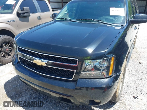 2011 Chevrolet Suburban LT with VIN 1GNSCJE09BR319675, listed as a IAAI auction lot 41966225 with 294,335 mi miles. Bid and sale history available at carsss.com. Image 6.