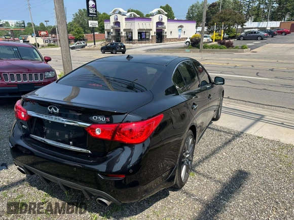 2017 Infiniti Q50 Red Sport 400 with VIN JN1FV7ARXHM870864, listed as a Copart auction lot 60896265 with 59,899 mi miles and Salvage title. Bid and sale history available at DreamBid. Image 4.