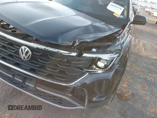 2024 Volkswagen Atlas SE with VIN 1V2JE2CA1RC235989, listed as a IAAI auction lot 41079770 with 9,723 mi miles and . Bid and sale history available at DreamBid. Image 6.
