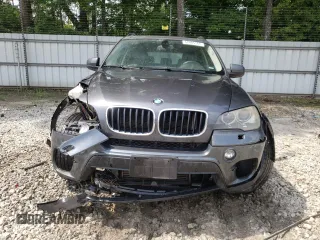 2012 BMW X5 35i z VIN 5UXZV4C55CL753810, wystawiony jako Copart lot #62405565 z przebiegiem 178 504 mil mil oraz Szkoda całkowita • Salvage title. Historia ofert i sprzedaży dostępna na DreamBid. Obrazek 5.