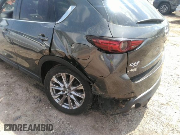 2019 Mazda CX-5 Grand Touring with VIN JM3KFBDM7K0606860, listed as a IAAI auction lot 41936338 with 93,057 mi miles. Bid and sale history available at carsss.com. Image 6.