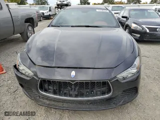 2015 Maserati Ghibli with VIN ZAM57XSA5F1149616, listed as a Copart auction lot 71738433 with 82,300 mi miles. Bid and sale history available at carsss.com. Image 5.