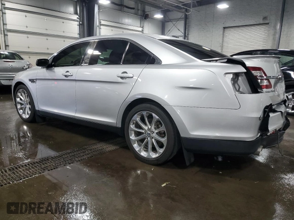 2014 Ford Taurus Limited with VIN 1FAHP2F80EG113121, listed as a Copart auction lot 50175165 with 124,749 mi miles and Salvage Title. Bid and sale history available at carsss.com. Image 2.