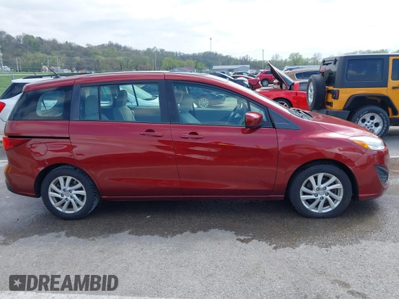 2012 Mazda 5 Sport with VIN JM1CW2BL9C0107471, listed as a IAAI auction lot 42021285 with 104,851 mi miles. Bid and sale history available at carsss.com. Image 13.