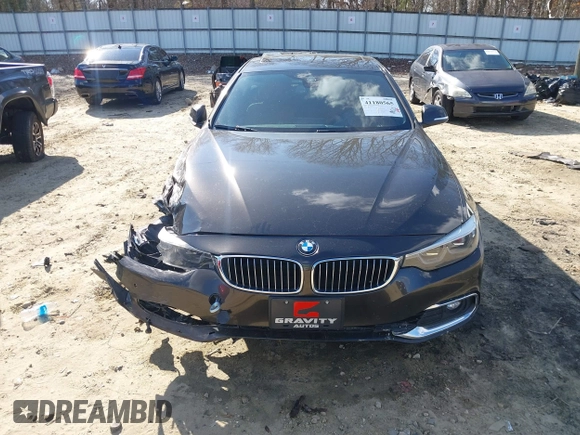 2018 BMW 4 Series 430i xDrive with VIN WBA4J3C54JBG95242, listed as a IAAI auction lot 41180565 with 83,710 mi miles and . Bid and sale history available at DreamBid. Image 11.