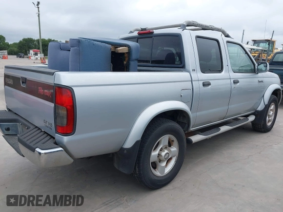 2000 Nissan Frontier XE with VIN 1N6ED27T2YC425703, listed as a IAAI auction lot 42687301 with 186,317 mi miles and . Bid and sale history available at DreamBid. Image 4.